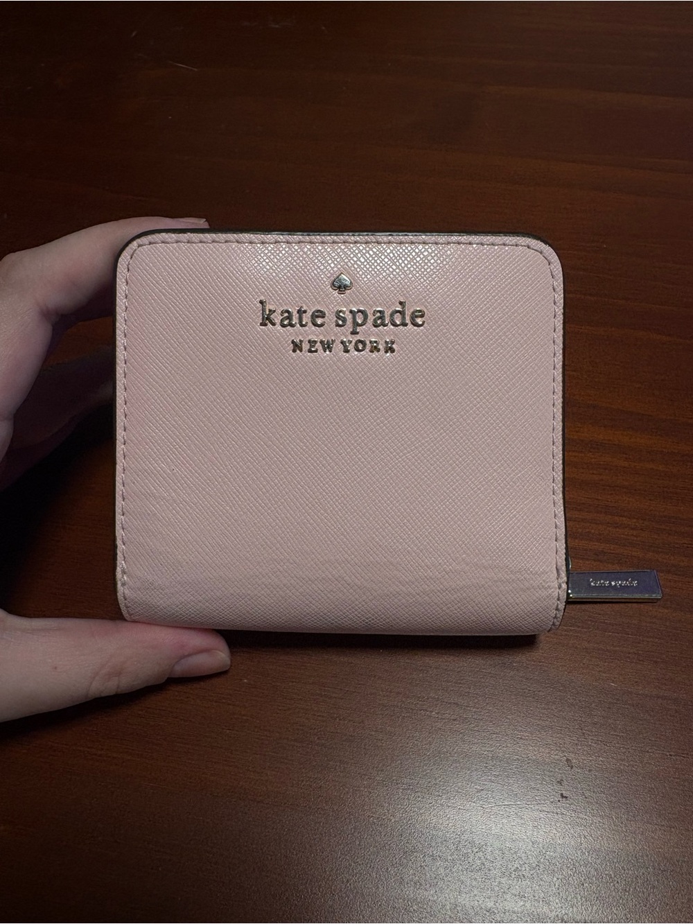 kate spade pale pink saffiano zip-around wallet